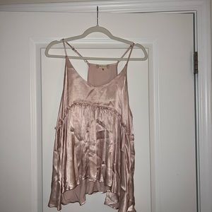 Pink tank top with a shiny texture to it. Size small from alterd state